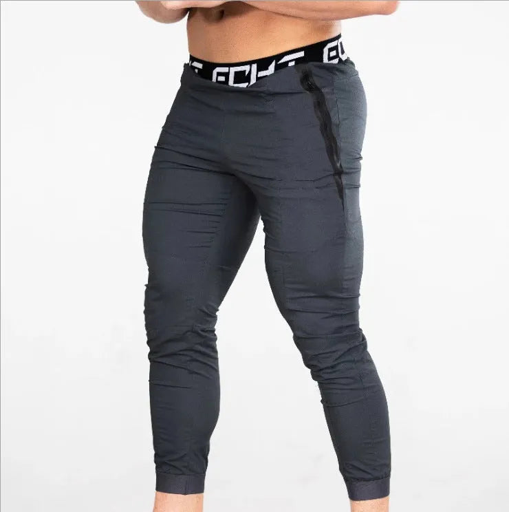 Cotton fitness sweatpants for men, black, with elastic waist, suitable for running and gym