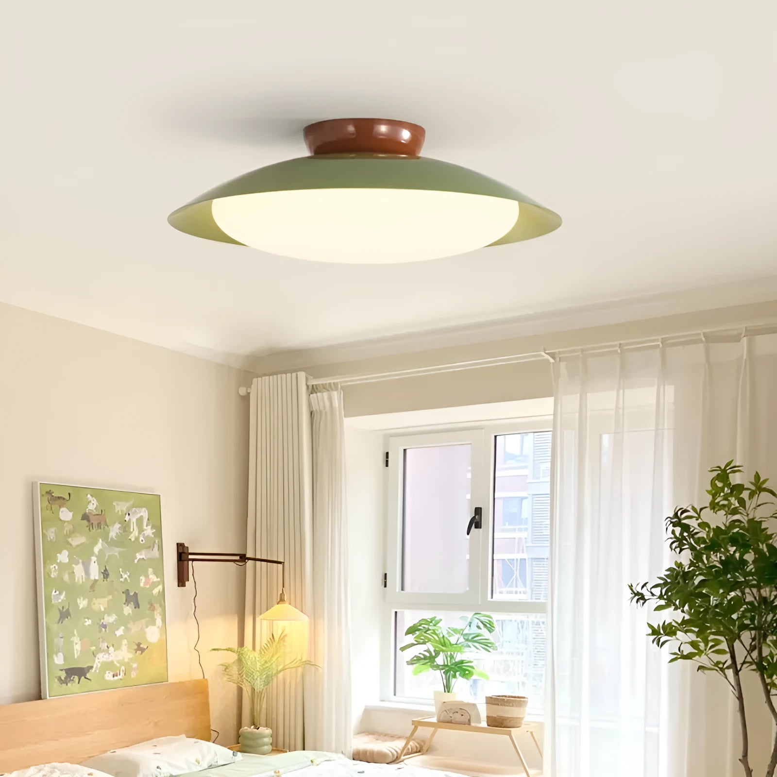 Modern cream style flying saucer ceiling lamp with curved iron shade in mint green.