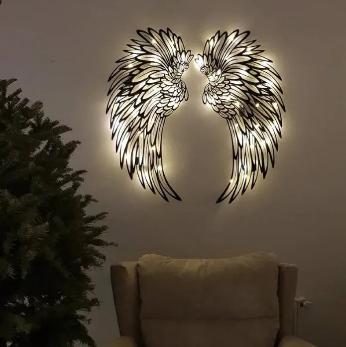Carved metal angel wings wall decor in iron with double-sided black finish, available with or without light