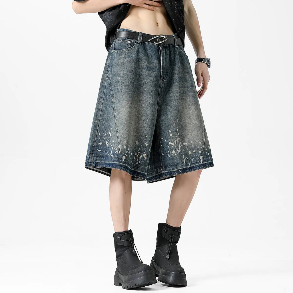 Men's retro blue denim shorts with washed finish and ripped knee detailing, straight leg cut
