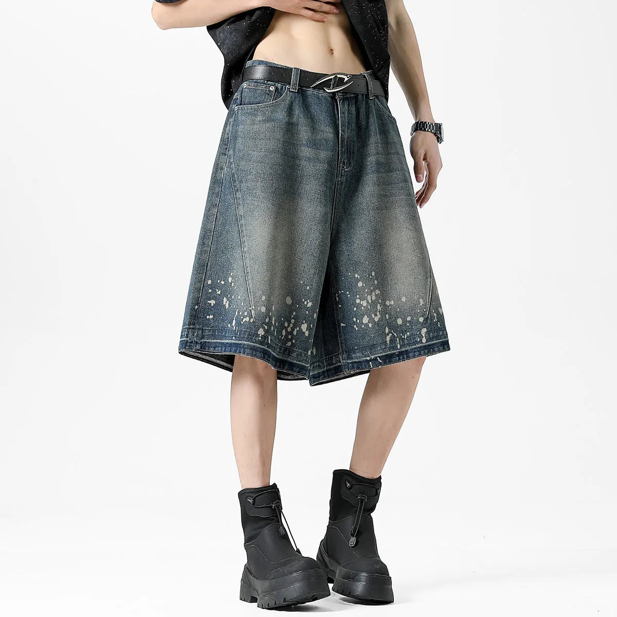 Men's retro blue denim shorts with washed finish and ripped knee detailing, straight leg cut