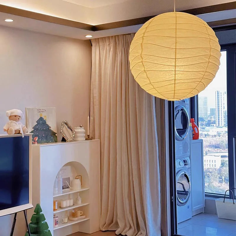 Japanese-style rice paper pendant chandelier in a living room setting.