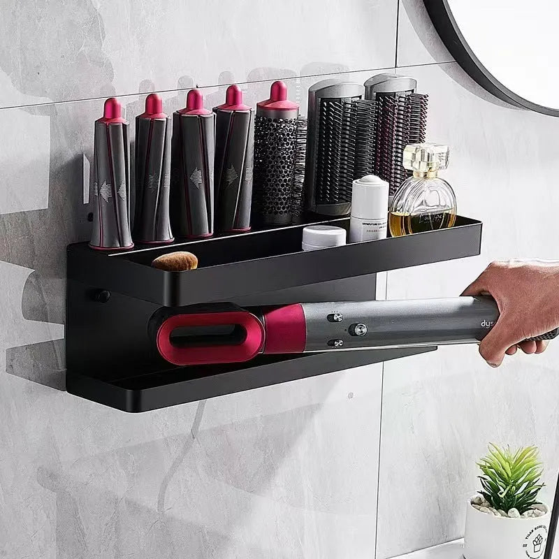 White double-layer aluminium punch-free bathroom storage rack holding a curling iron and hairdryer.