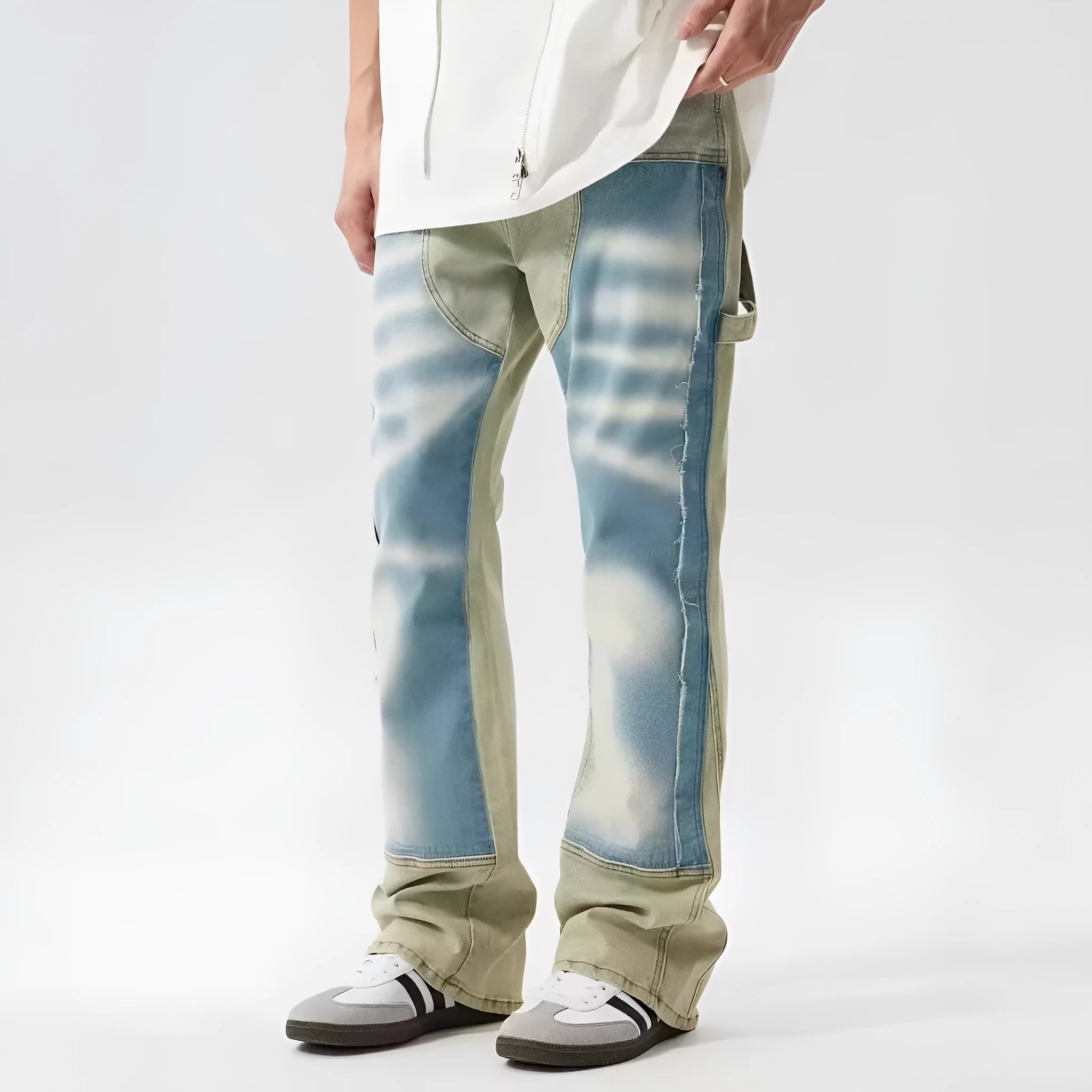 Yellow and blue retro patchwork splash-ink damaged design jeans on a mid-waist fit.