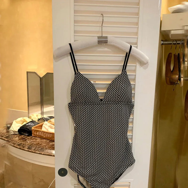 Blue one-piece swimsuit with covered belly and chest design for hot springs