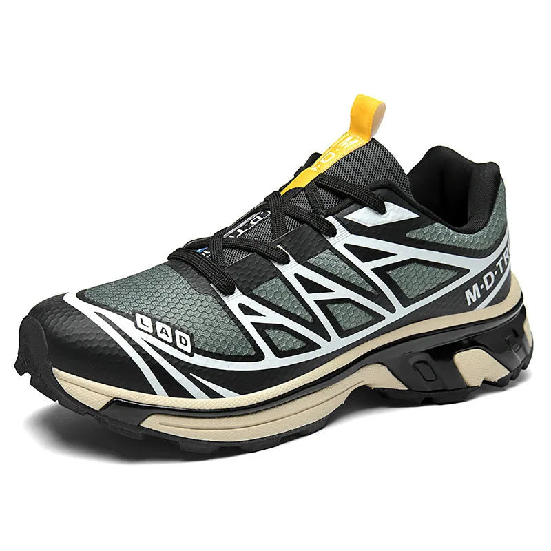Low-top outdoor hiking shoes in artificial leather with mesh lining and rubber sole.