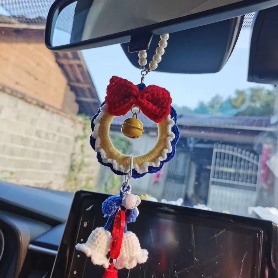 Handmade Snow White car hanging ornament with plush yarn weaving, approximately 15 cm long