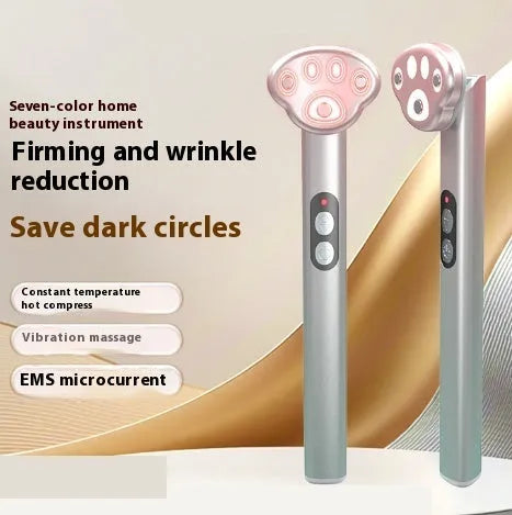 Gradient pink cat's paw eye massager with micro-current vibration and coloured light function