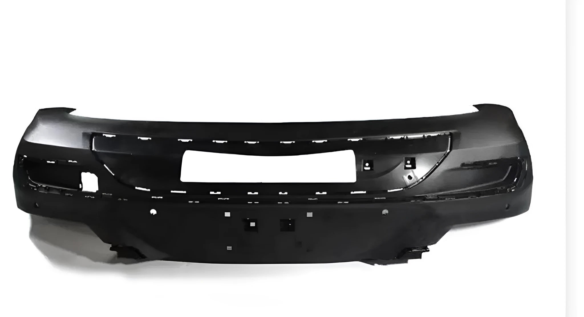 Black plastic vehicle bumper showing one-piece moulded construction.