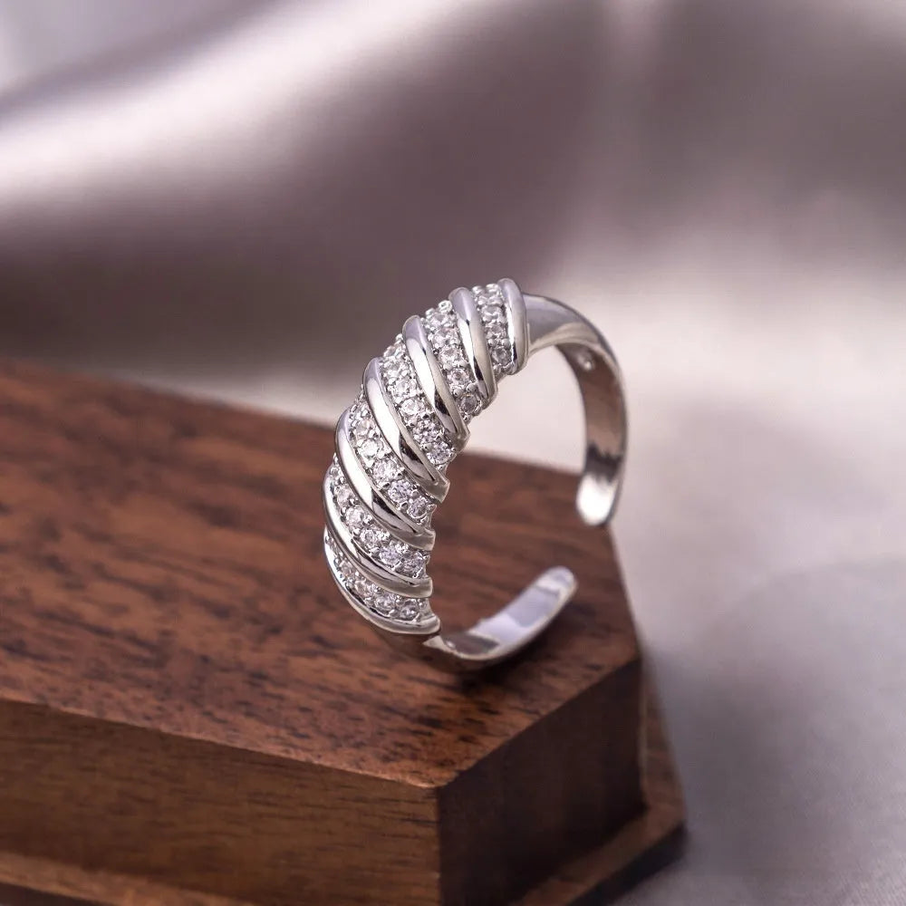Copper open mouth ring with zircon ornament, adjustable U-shaped design, electroplated J-060 gold finish on grey background