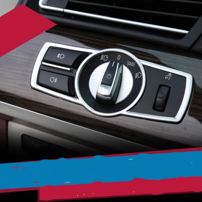 Silver ABS plastic interior sticker for BMW headlight switch frame on 5 Series, 7 Series, X3, and X4 models