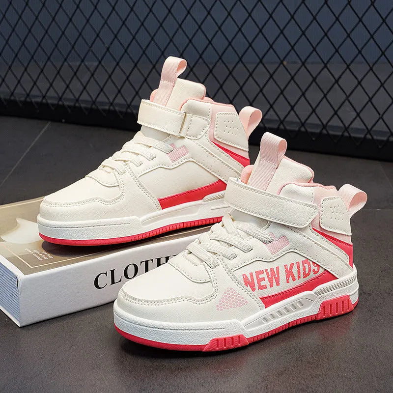 Children's buckle-fastened street sneakers in neutral colours with PU upper and rubber sole.
