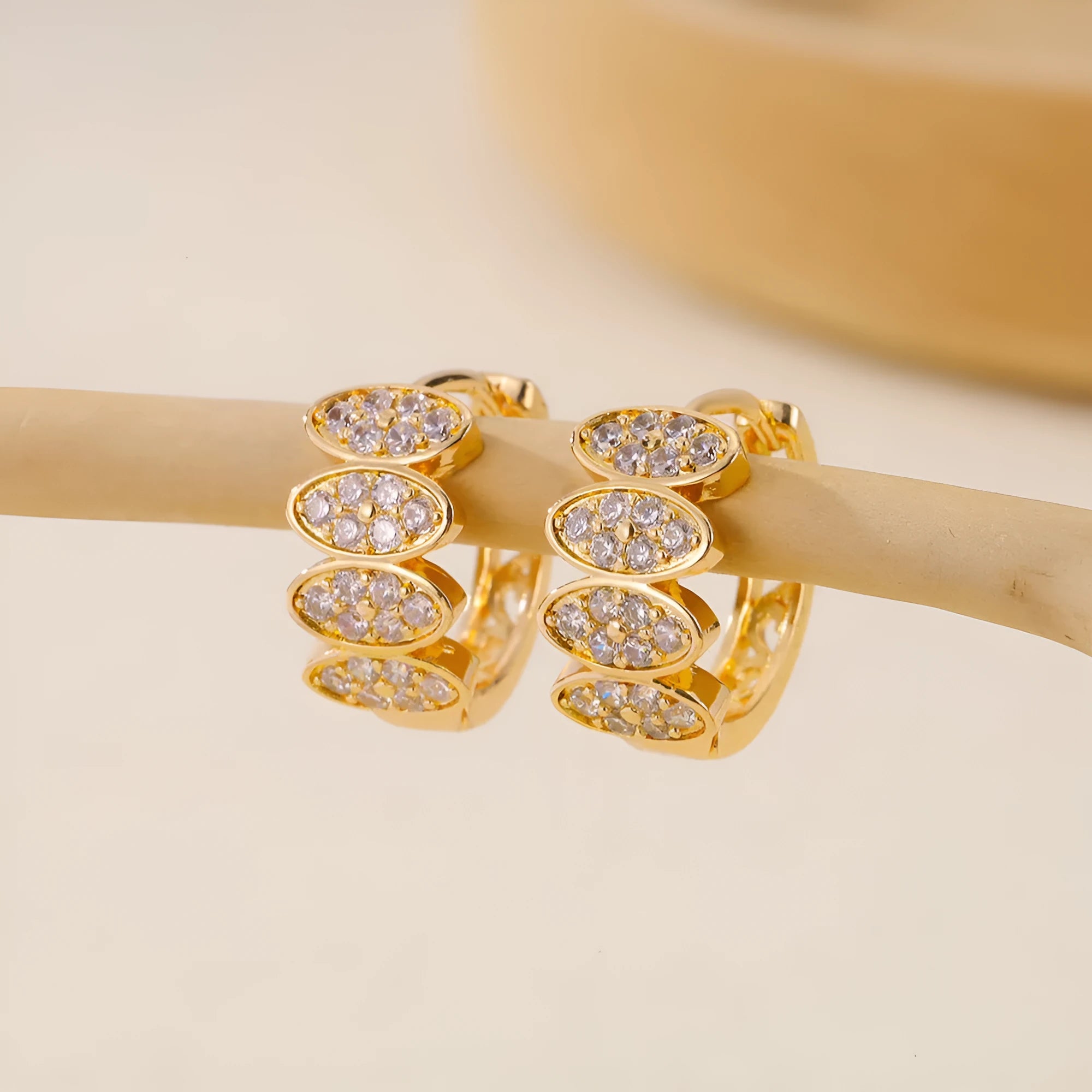 A pair of women's copper earrings with zircon stone inlay in a contemporary ins style, colour EH412018.