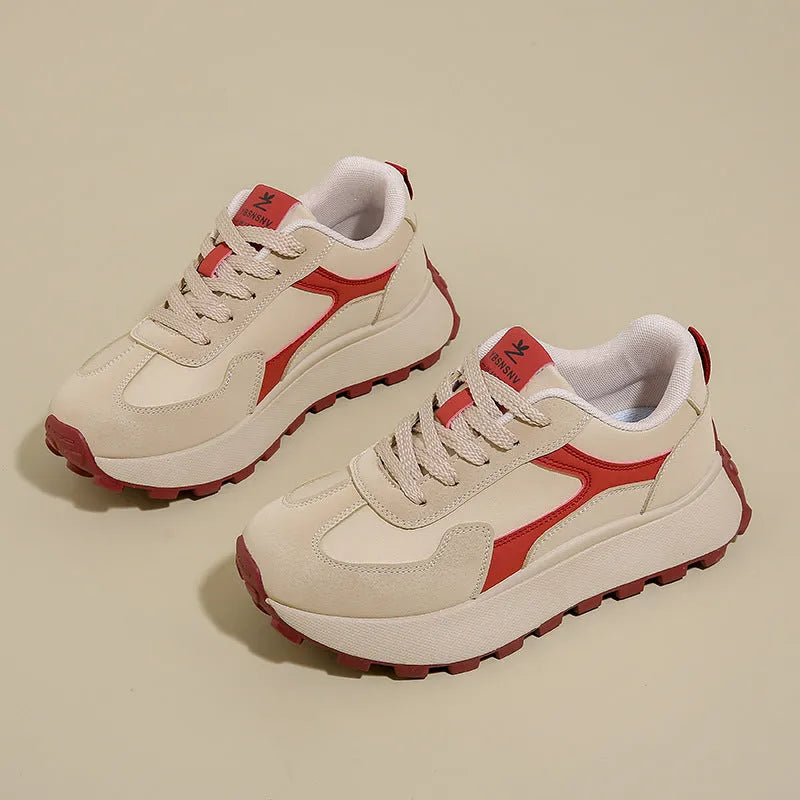 Women's solid colour low-top platform trainers with lace-up front and flat rubber sole