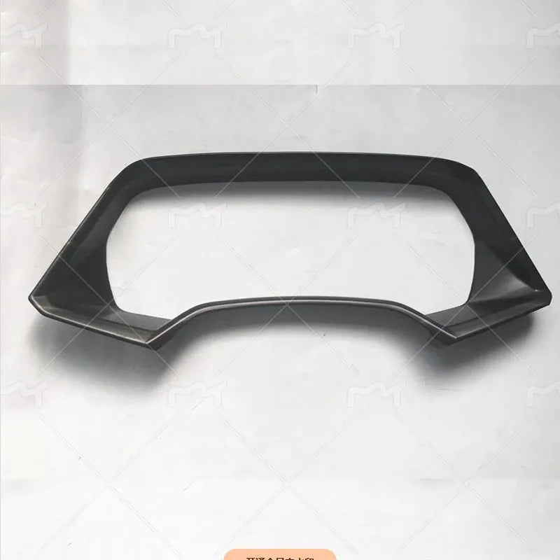 Dashboard decorative frame for BMW X5L in carbon fibre and peach wood finishes