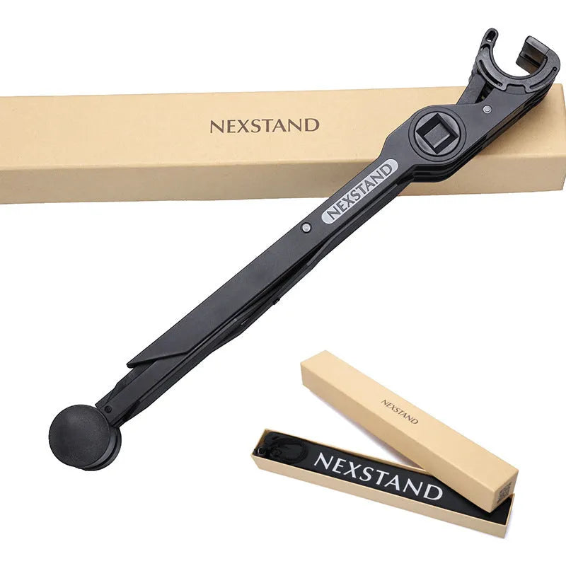 Black reinforced nylon folding laptop stand shown in a folded position with dimensions.