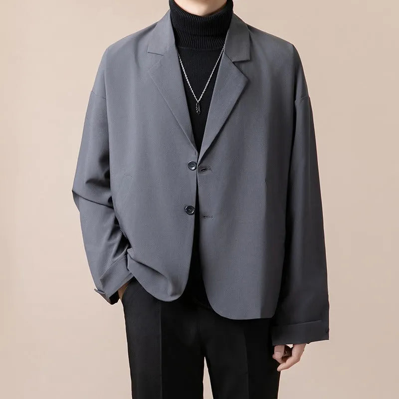Men's loose fit casual suit jacket in apricot colour on a hanger
