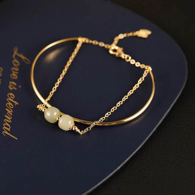 Hetian jade women's bracelet with gold inlay, showing lucky bead design in single, double, and three bead styles.