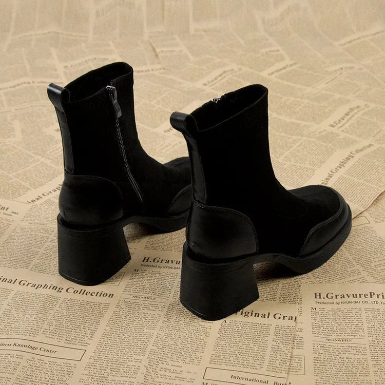 Black thick bottom chunky heel Martin boots for women with rubber sole, side view