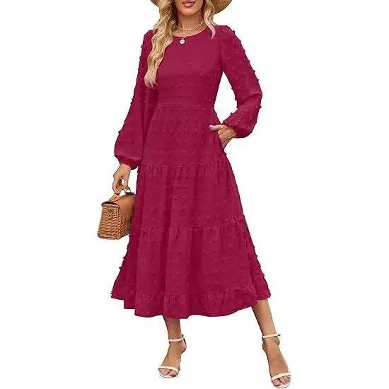 Beige women's high-waisted long sleeve dress with ruffled sleeves on a hanger.