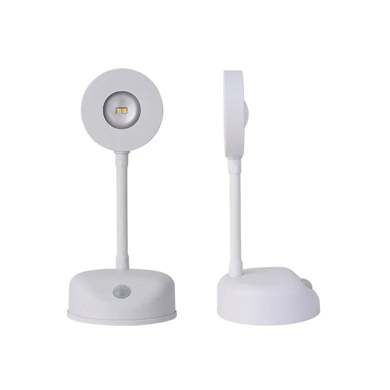 Modern geometric wireless rechargeable wall spotlight in black or white with remote control.