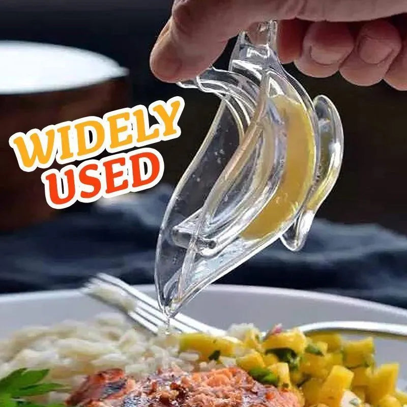 Transparent acrylic bird shaped manual lemon juicer with dimensions 12x3.5x5.1cm on a clean countertop