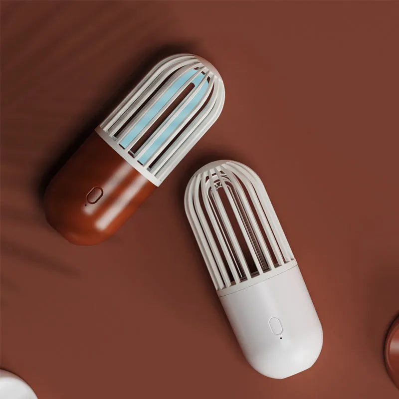 Portable capsule ultraviolet disinfection lamp with compact design measuring 52x52x136mm