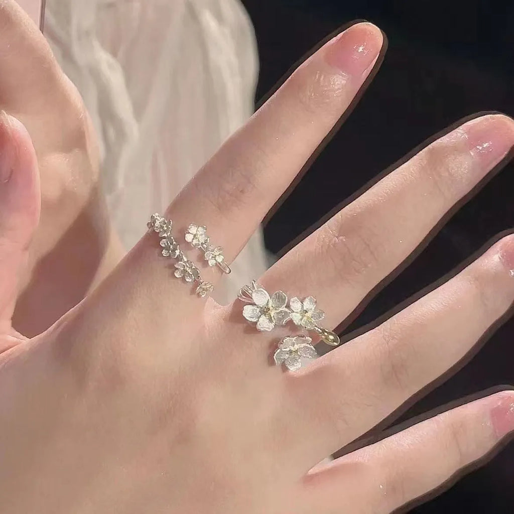 Adjustable open mouth jasmine flower ring with three-dimensional floral design