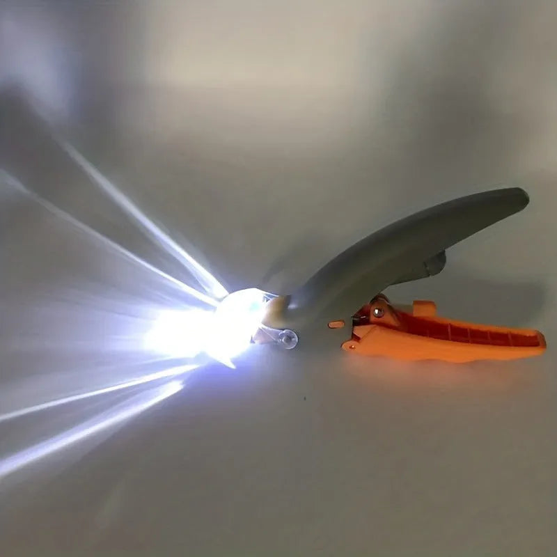 Yellow LED pet nail trimmer with magnifying glass catcher and light-up cutting head