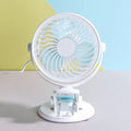 Small USB desktop fan in white plastic with three blades, shown as both clip-mounted and floor-standing versions