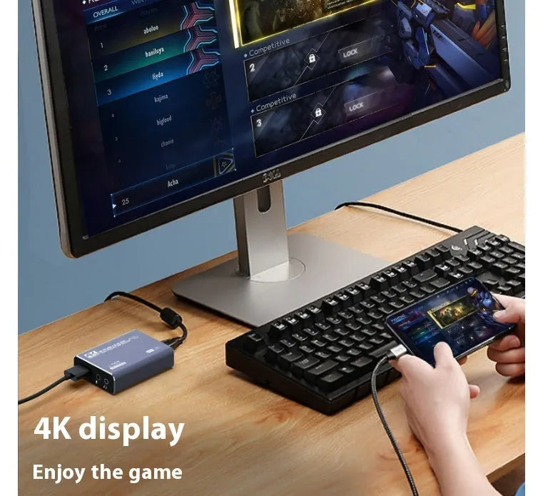 Black 4K set-top box for gaming recording and 1080p media streaming with data cable