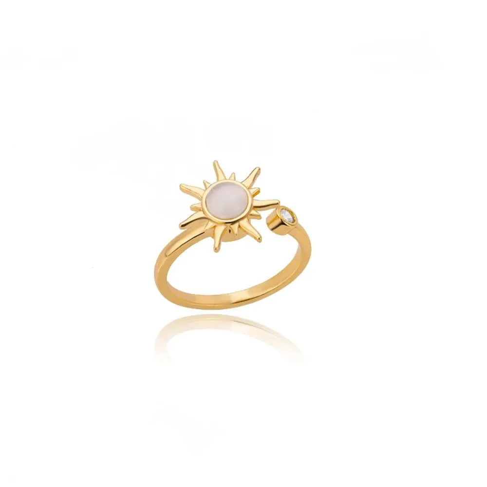 Gold and platinum coloured adjustable copper decompression ring with geometric rotatable design