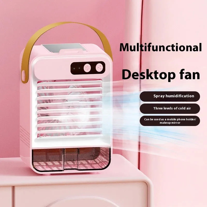 Compact dark green desktop USB fan with five blades on a desk.