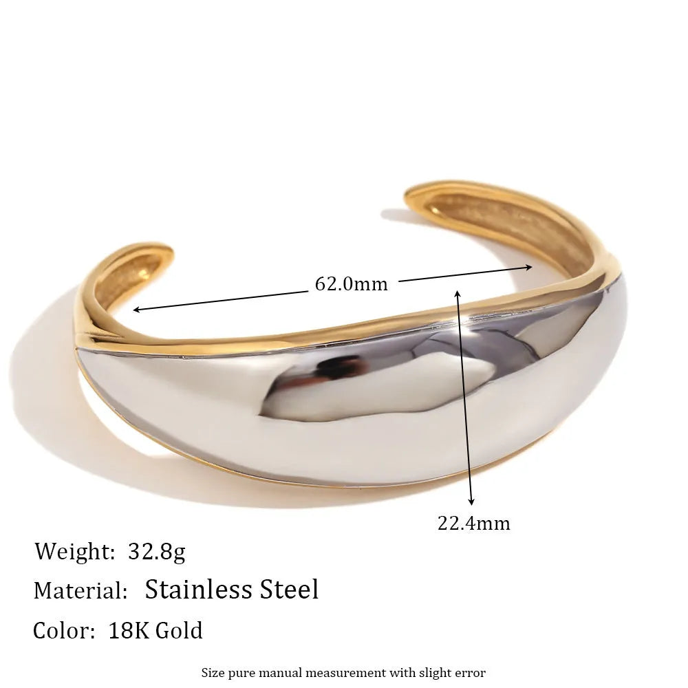 Gold tone electroplated stainless steel jewellery set with geometric shapes including earrings, bracelet and necklace