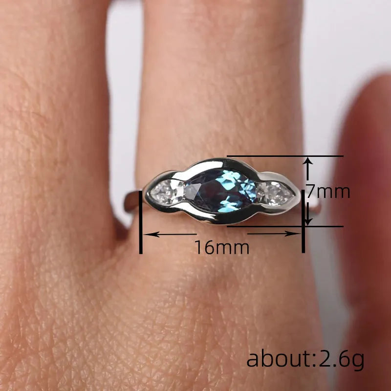 Geometric ellipse copper ring with inlaid zircon stones in white gold colour finish