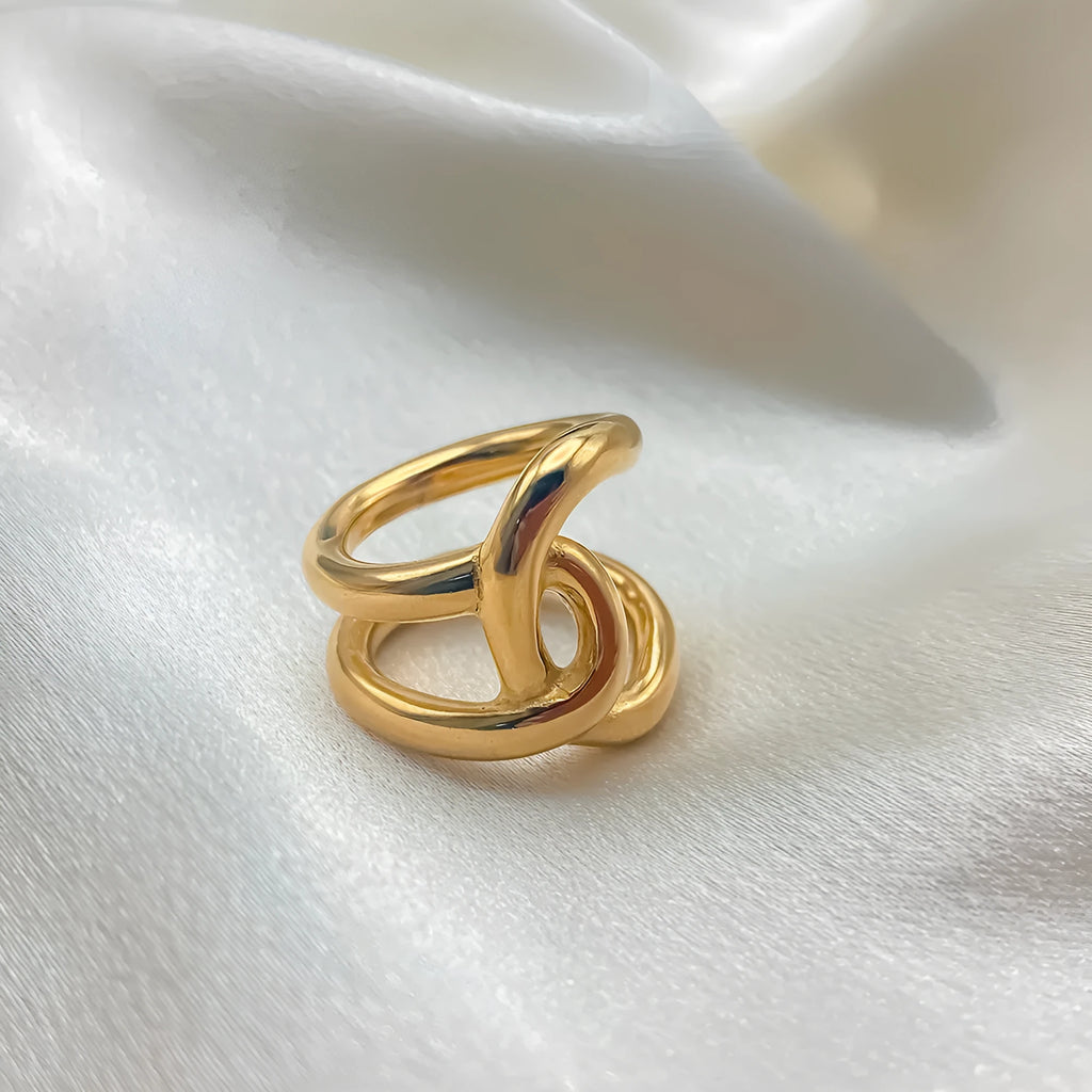 Adjustable geometric U-shaped ring with knotted design in stainless steel available in five sizes