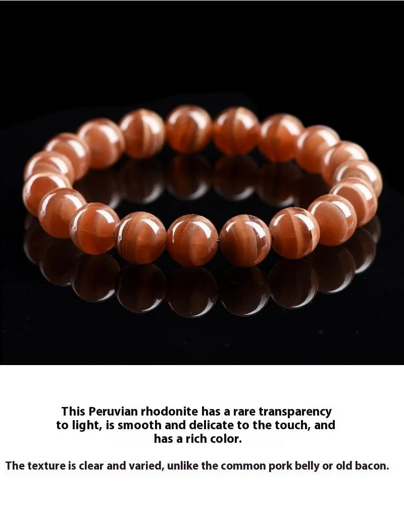 Natural old mine rhodochrosite round bead bracelet with ruyi detail, shown in 6mm and 8mm size options.