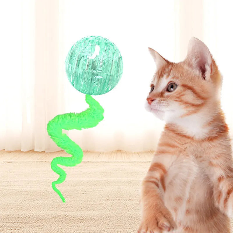 Interactive bouncy ball cat toy with plush tail in green, pink and purple colour options