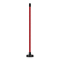 Red aluminium alloy magnetic golf alignment trainer bar on a putting green.