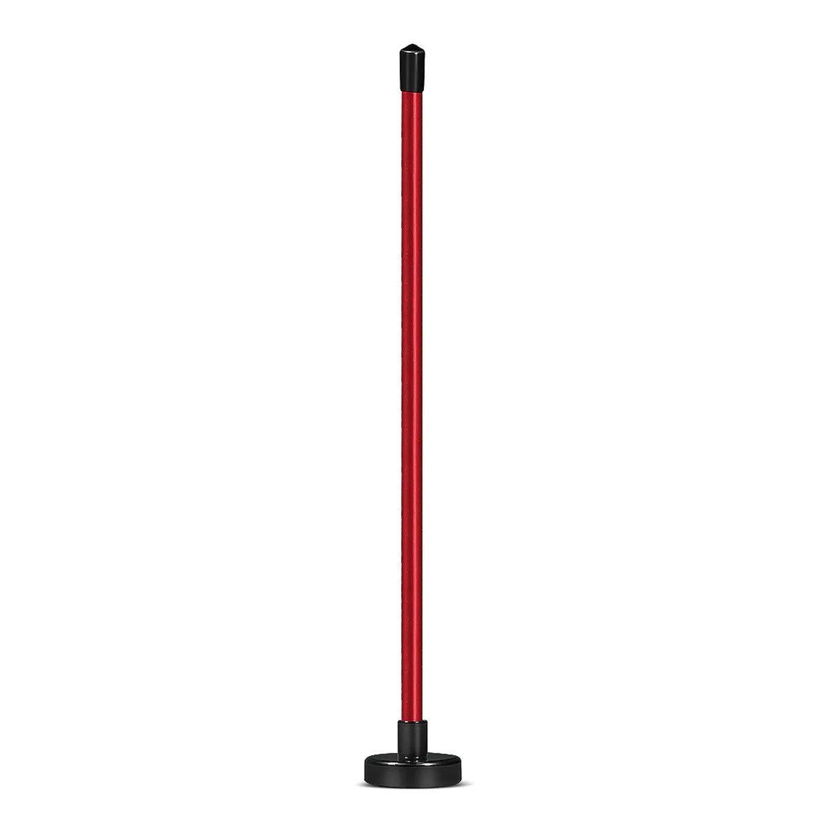 Red aluminium alloy magnetic golf alignment trainer bar on a putting green.