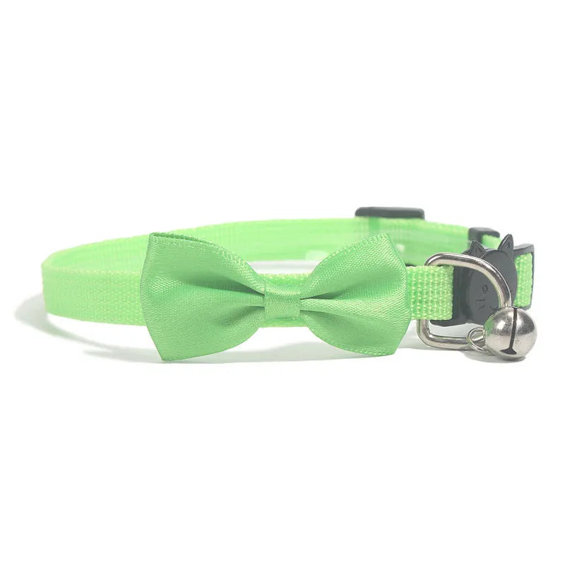 Adjustable nylon cat bow collar with a bell in a striped pattern, shown in a bright colour.