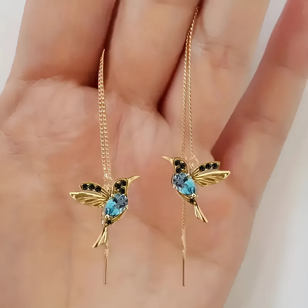 Women's long bird hanging earrings in alloy with blue electroplated finish.