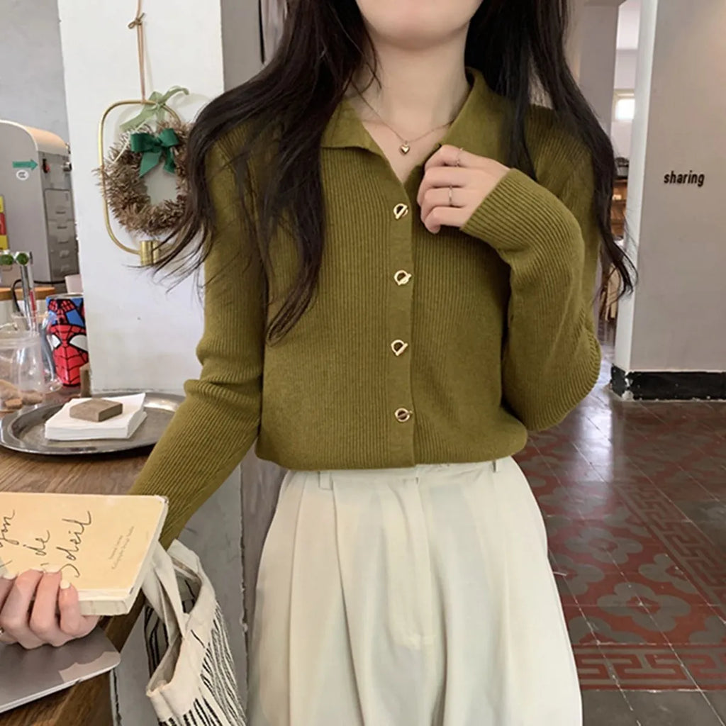 Long-sleeve loose-fit viscose knitted cardigan top in oatmeal colour.