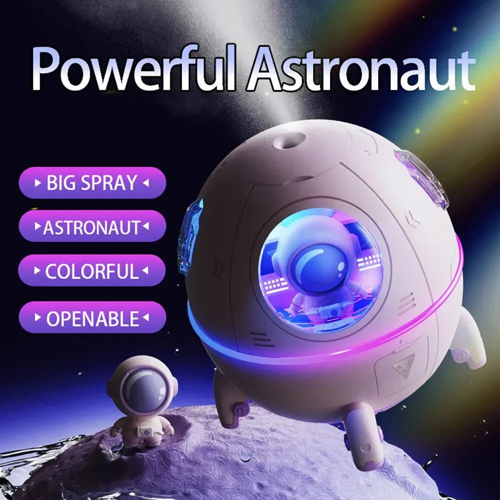 Light purple astronaut-shaped desktop USB humidifier with LED lights on a desk