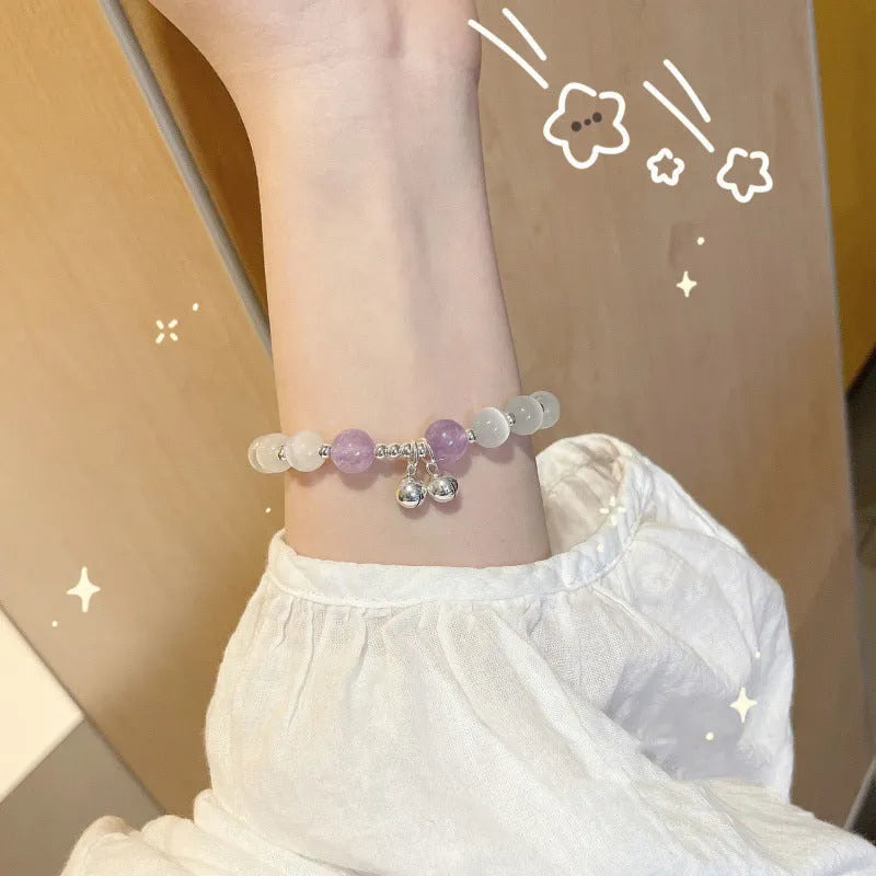 Chinese style glass bead bracelet with bamboo leaf design and manual craftsmanship details.
