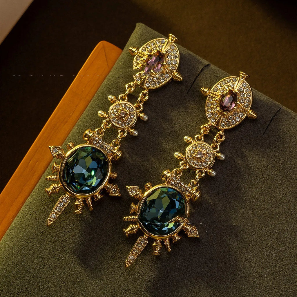 Gold geometric court style stud earrings with retro design and round elements