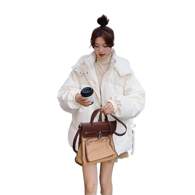 Women's loose insulated jacket with princess sleeves in milky white colour