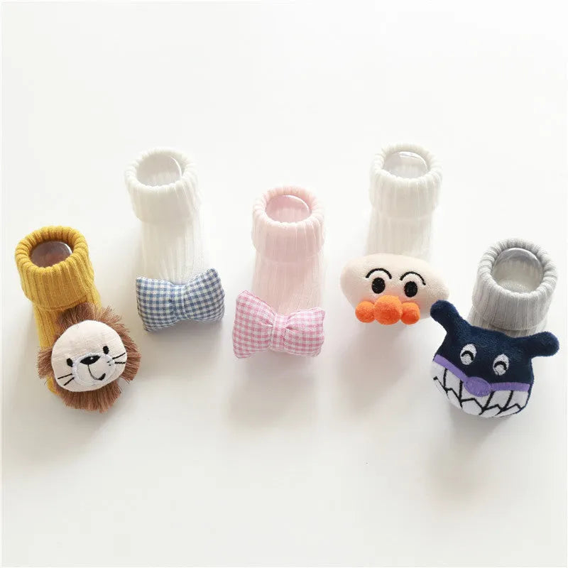 Cotton baby floor socks in multiple designs including animal prints and bows for infants 0-3 months