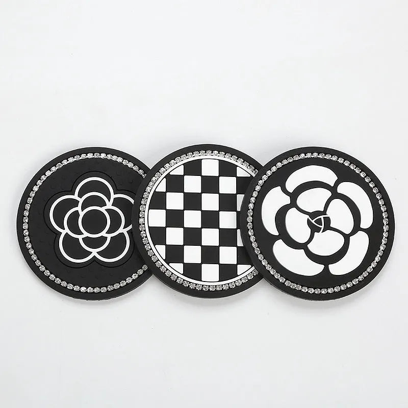 PVC plastic car cup holder mat coaster in black and white checkerboard pattern.