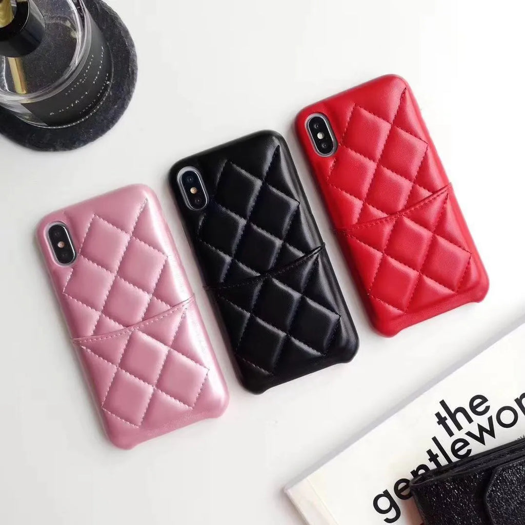 Leather mobile phone case for iPhone, shown in black, pink, and red colour options.